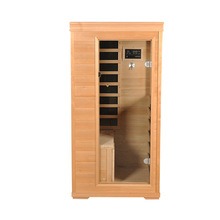 Salle de sauna à porte vitrée pour une personne